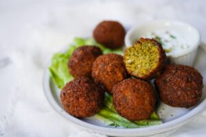 oman best hostel Mini falafels with yogurt sauce